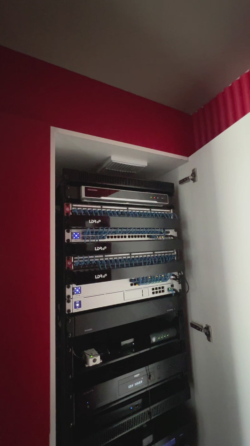 Check out this home data setup using two Titan AV server racks, neatly tucked into a cupboard.