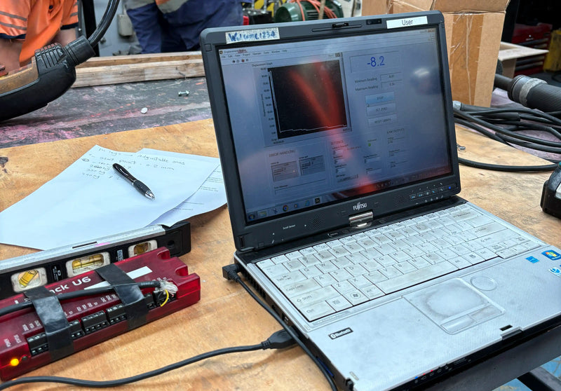 Laptop Showing -8.2 Mid-Span Deflection Measurement